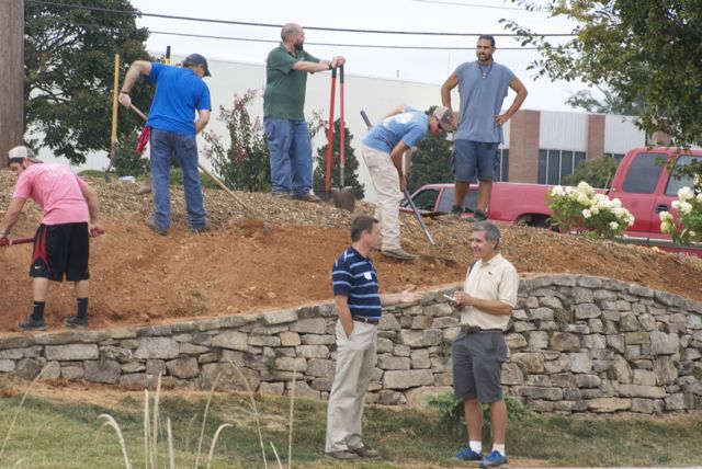 Students finishing up wall.  Kevin Parris & Bob  Polomsky just standing around.