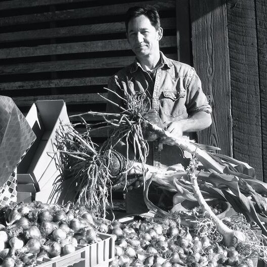 Tom Hall filling gift packs 